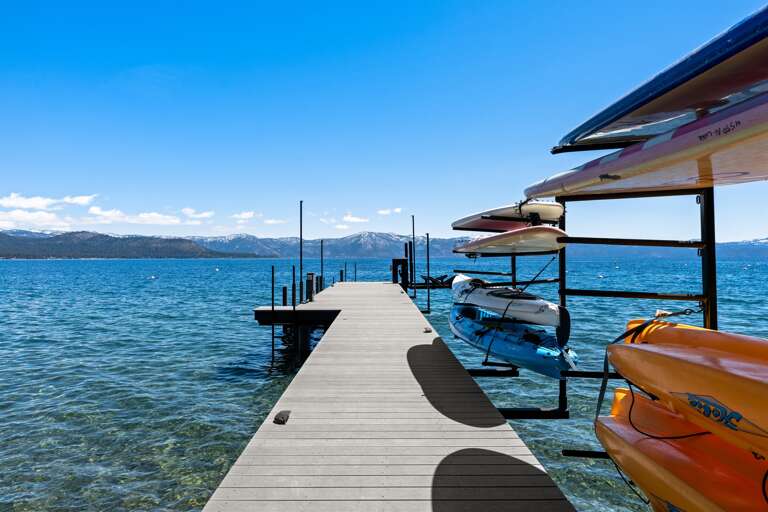 Private pier with kayaks and paddleboards available for guest use