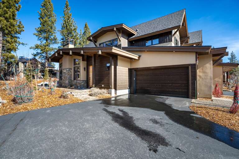 The home’s mountain modern design welcomes you with space for 1 car in the driveway and 1 in the garage. Please note, it is a shared driveway and street parking is not allowed at anytime. The home’s mountain modern design welcomes you with space for 1 car in the driveway and 1 in the garage. Please note, it is a shared driveway and street parking is not allowed at anytime.