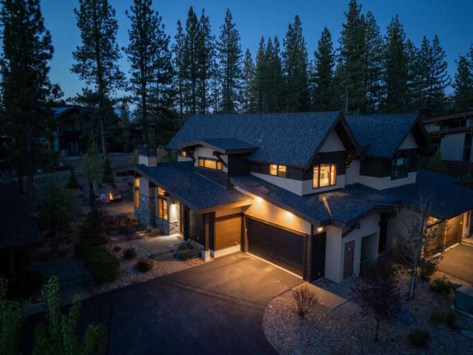 Breathe in the crisp mountain air as you relax on the spacious patio, complete with a natural gas BBQ for easy outdoor cooking, a large umbrella for shade, and a cozy gas firepit—perfect for u