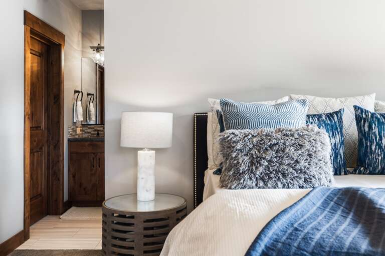 This upstairs luxurious master suite boasts a plush king bed, 49" Smart TV and an en-suite bathroom, making it a serene retreat after a day of Tahoe adventures. This upstairs luxurious master suite boasts a plush king bed, 49" Smart TV and an en-suite bathroom, making it a serene retreat after a day of Tahoe adventures.