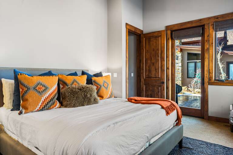 This first-floor bedroom offers ultimate comfort with a plush king bed, a 49" Smart TV, and an en-suite bathroom. Wake up to stunning views right from your room, and step outside to the patio to soak in the beauty of Schaffer’s Mill. This first-floor bedroom offers ultimate comfort with a plush king bed, a 49" Smart TV, and an en-suite bathroom. Wake up to stunning views right from your room, and step outside to the patio to soak in the beauty of Schaffer’s Mill.