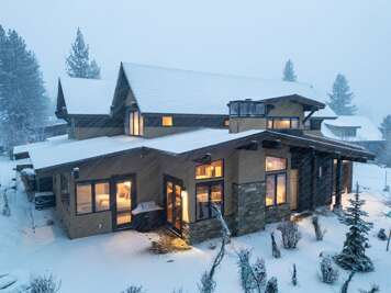 Unwind in the warmth of Heartwood Mountain Escape. After a day of adventure, relax by the gas fireplace, soaking in the cozy ambiance as you enjoy the stunning mountain views.