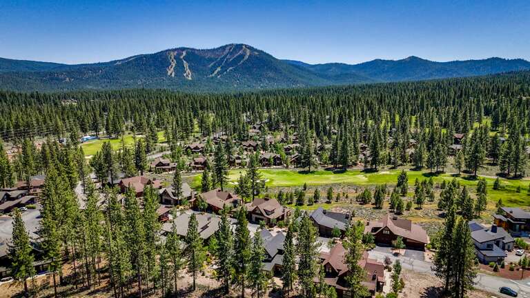 A stunning view of the home, across the street from the 7th green of Schaffer’s Mill Golf Course, with the rugged beauty of Lookout Mountain at Northstar Ski Resort providing a breathtaking ba