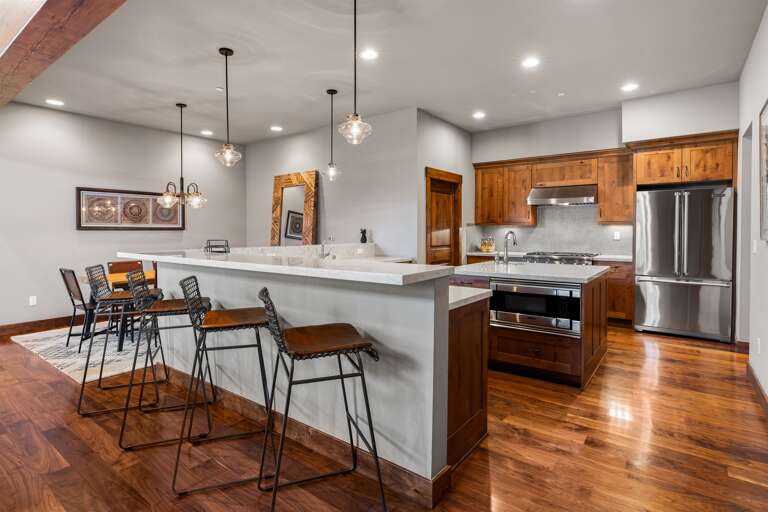 A chef's delight! The gourmet kitchen features sleek countertops, state-of-the-art appliances, and an island perfect for meal prep or casual dining. A chef's delight! The gourmet kitchen features sleek countertops, state-of-the-art appliances, and an island perfect for meal prep or casual dining.