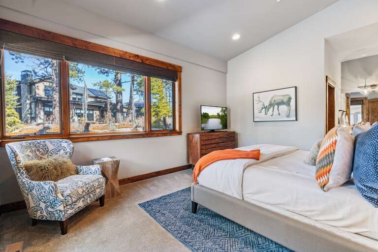 This first-floor bedroom offers ultimate comfort with a plush king bed, a 49" Smart TV, and an en-suite bathroom. Wake up to stunning views right from your room, and step outside to the patio to soak in the beauty of Schaffer’s Mill. This first-floor bedroom offers ultimate comfort with a plush king bed, a 49" Smart TV, and an en-suite bathroom. Wake up to stunning views right from your room, and step outside to the patio to soak in the beauty of Schaffer’s Mill.