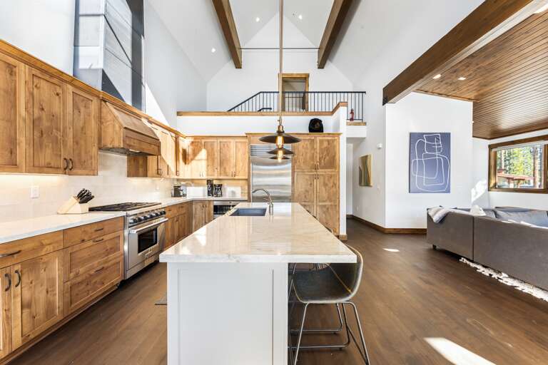 A chef's delight! The gourmet kitchen features sleek countertops, state-of-the-art appliances, and an island perfect for meal prep or casual dining.