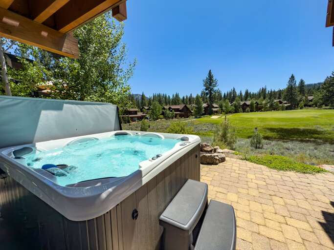 Unwind on the lower patio, where a private hot tub invites you to relax while soaking in the stunning views of the 7th green and Lookout Mountain. Perfect for peaceful mornings or magical evenings under the stars.