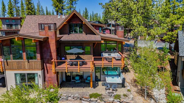 Capture stunning sunsets from the patio as the sky transforms with hues of orange and pink over the mountains.