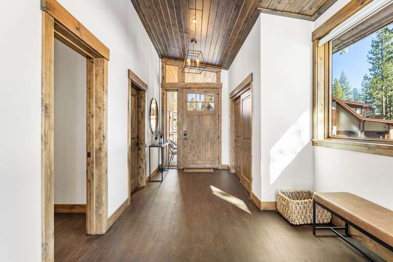 Front entryway with large closet for storing coats and access to the garage. Front entryway with large closet for storing coats and access to the garage.