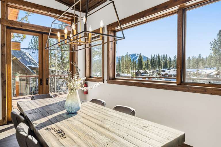 The dining table seats up 10 people and offers stunning views of the 7th green and Lookout Mountain.