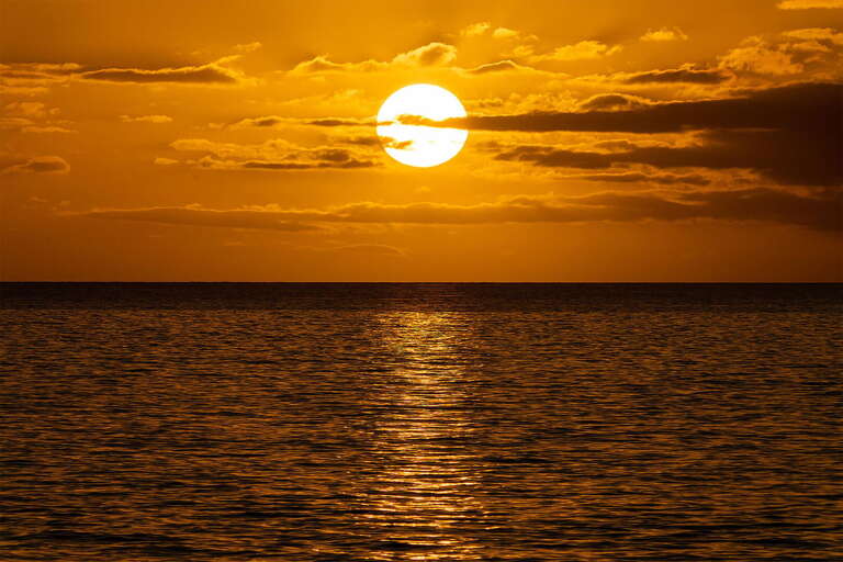 Sunset Sinking, Sea Sparkling, Serene Scene