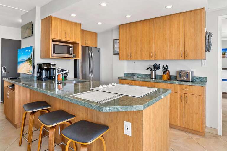 Kitchen Interior With Wooden Cabinets And Breakfast Bar