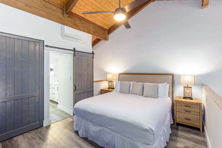 Bedroom Beyond: Beams, Bright Bedside Bulbs, Breezy Bathroom Beckoning Bedroom Beyond: Beams, Bright Bedside Bulbs, Breezy Bathroom Beckoning