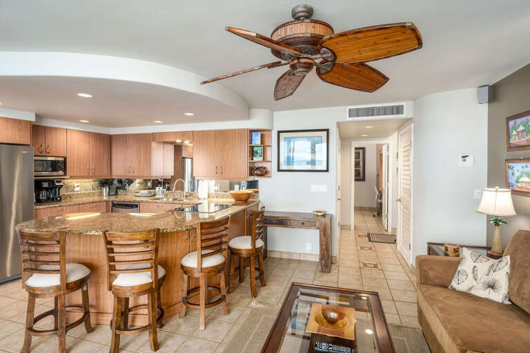 Interior Of A Vacation Rental Living Room With Kitchen And Seating Area