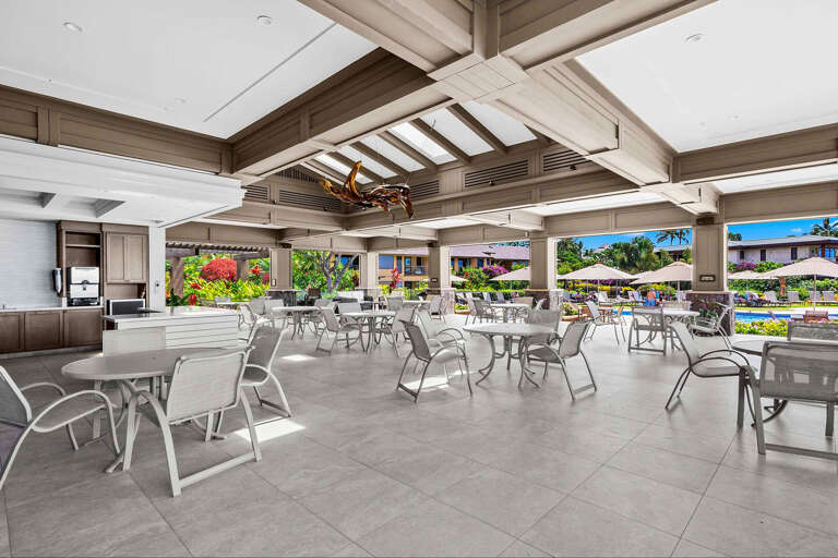 Spacious Dining Deck Displaying Panoramic Poolside Views