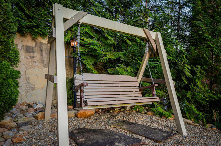 Porch swing in the outdoor pavilion area