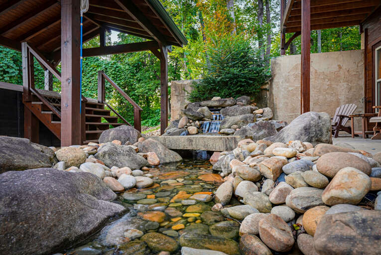 Outdoor pavilion with waterfall feature