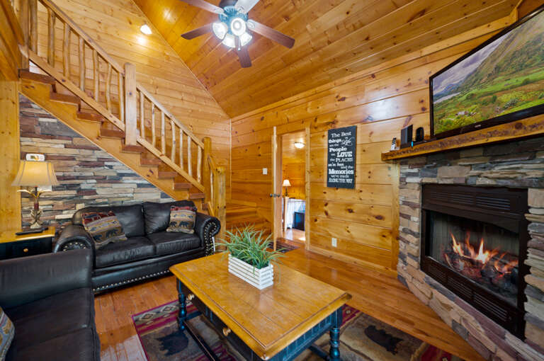Vacation Rental: Rustic Retreat With Wooden Walls, Leather Seating, And Lively Fire