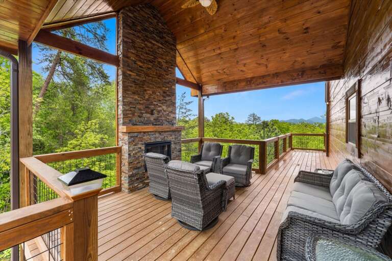 Wooded Retreat Deck With Stone Pillar And Seating Area