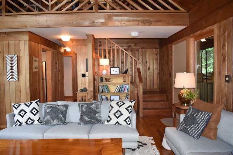 Great Room Couch With Stairs To Loft