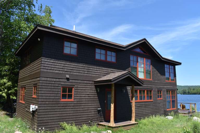 New entrance to house and steps onto deck