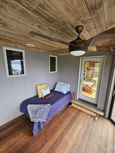 Twin Bed On Screened-in Porch