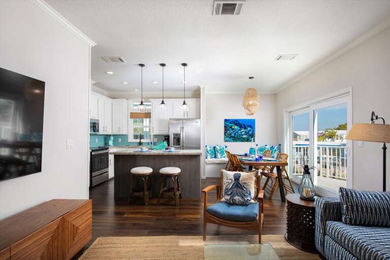Spacious Sea-view Living Space With Sleek Kitchen And Serene Sitting Area