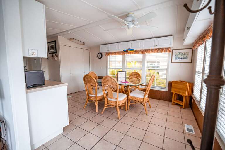 Bright Breakfast Nook With Bamboo Chairs, Vacation Rental Dining Area Bright Breakfast Nook With Bamboo Chairs, Vacation Rental Dining Area