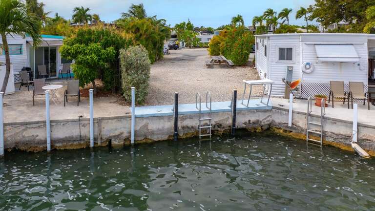 Seaside Structure Shimmering Beside Sandy Shore