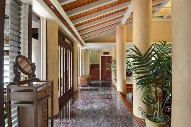 Polished Passage With Pillars And Plants, Bright Beams Above