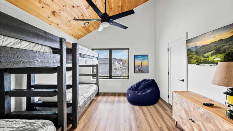 1 King Bedroom and 1 Bedroom with 2 Sets of Twin Bunks, Shared Bathroom in hallway