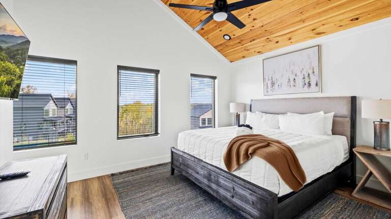 1 King Bedroom and 1 Bedroom with 2 Sets of Twin Bunks, Shared Bathroom in hallway