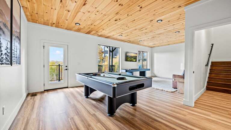Game Room with Full Size Pool Table, Large Screen SMART TV, Sand Shuffle Board, Full Size Sofa and Private Bathroom with Shower 