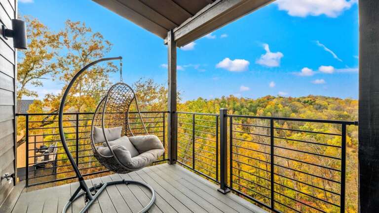 Large Deck off entry level dining room with plenty of seating with relaxing mountain views
