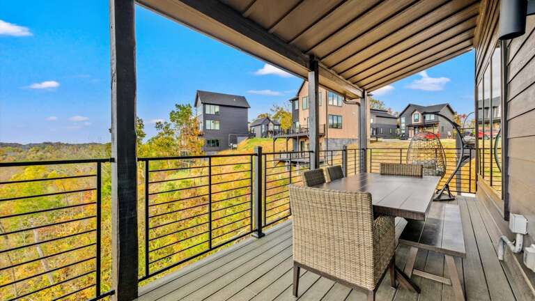 Large Deck off entry level dining room with plenty of seating with relaxing mountain views