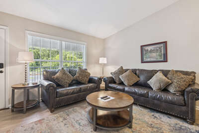 Spacious Living Room with Fireplace, Sleeper Sofa and SMART TV with Cable & WIFI throughout vacation rental