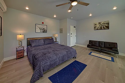 Spacious one-room studio condo with a king bed, tv, microwave, coffee maker and small refrigerator
