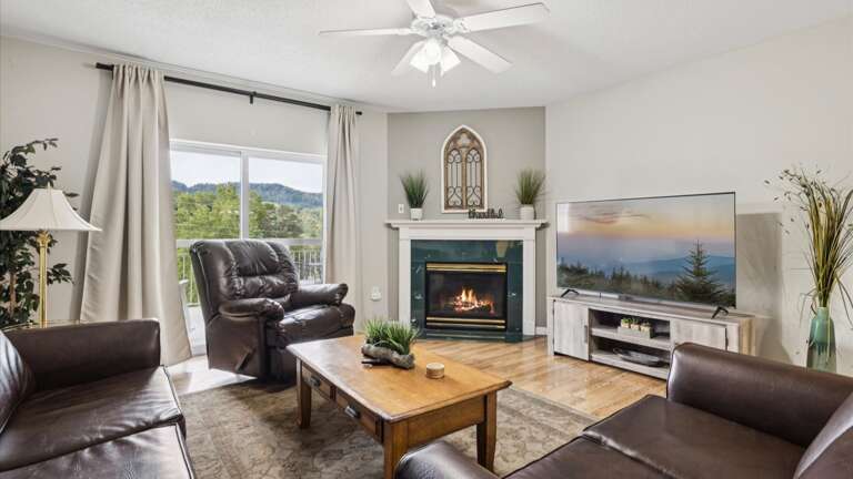 Spacious Living Room with Gas Fireplace, Sleeper Sofa and SMART TV with Cable & WIFI throughout vacation rental Spacious Living Room with Gas Fireplace, Sleeper Sofa and SMART TV with Cable & WIFI throughout vacation rental