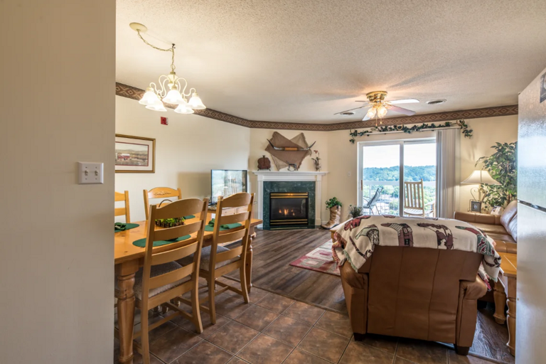 Spacious Living Room with Gas Fireplace, Sleeper Sofa and SMART TV with Cable & WIFI throughout vacation rental