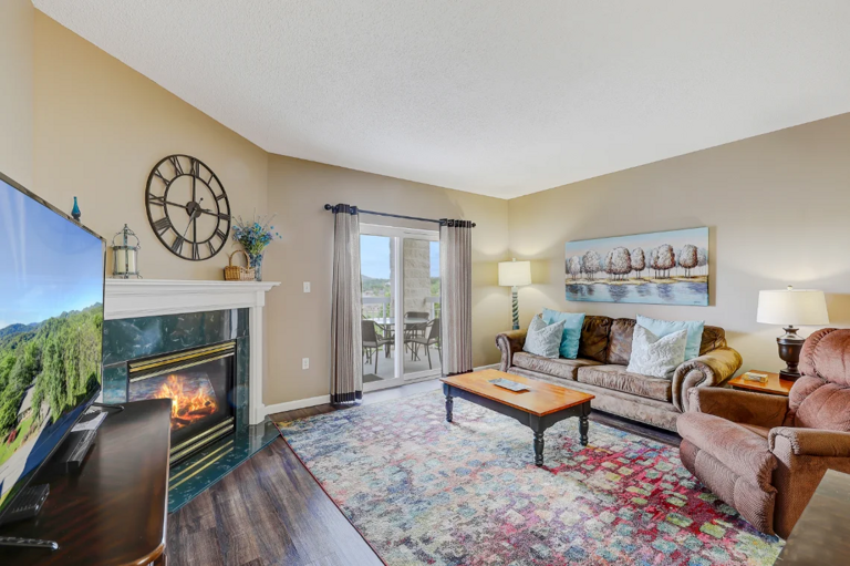Spacious Living Room with Gas Fireplace, Sleeper Sofa and SMART TV with Cable & WIFI throughout vacation rental Spacious Living Room with Gas Fireplace, Sleeper Sofa and SMART TV with Cable & WIFI throughout vacation rental