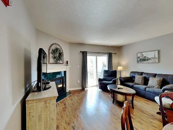 Spacious Living Room with Gas Fireplace, Sleeper Sofa and SMART TV with Cable & WIFI throughout vacation rental