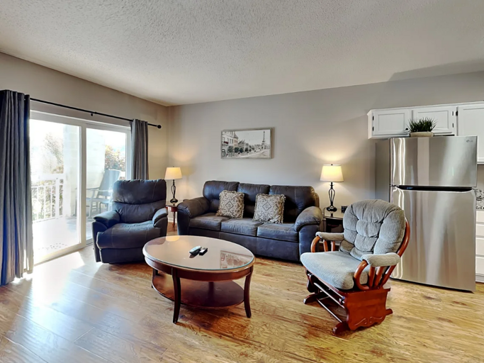 Spacious Living Room with Gas Fireplace, Sleeper Sofa and SMART TV with Cable & WIFI throughout vacation rental Spacious Living Room with Gas Fireplace, Sleeper Sofa and SMART TV with Cable & WIFI throughout vacation rental