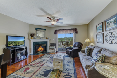Spacious Living Room with Gas Fireplace, Sleeper Sofa and SMART TV with Cable & WIFI throughout vacation rental