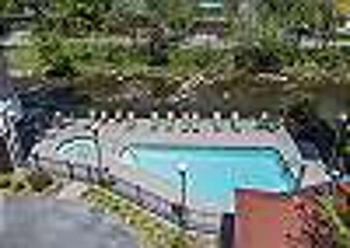 Outdoor Seasonal Resort Pool and Hot Tub