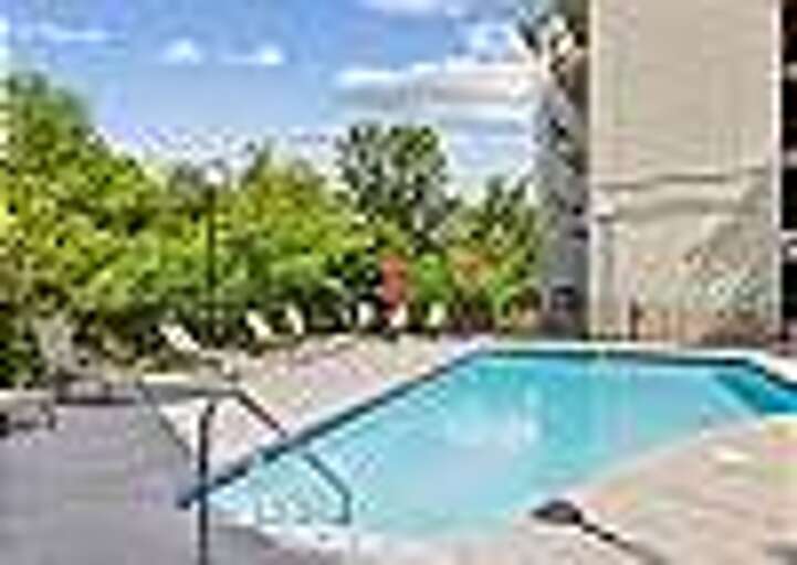 Outdoor Seasonal Resort Pool and Hot Tub