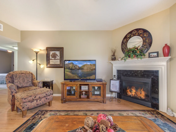 Spacious Living Room with Seasonal Gas Fireplace, Sleeper Sofa and SMART TV with Cable & WIFI throughout vacation rental