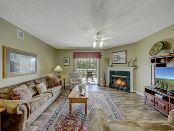 Spacious Living Room with Gas Fireplace, Sleeper Sofa and SMART TV with Cable & WIFI throughout vacation rental