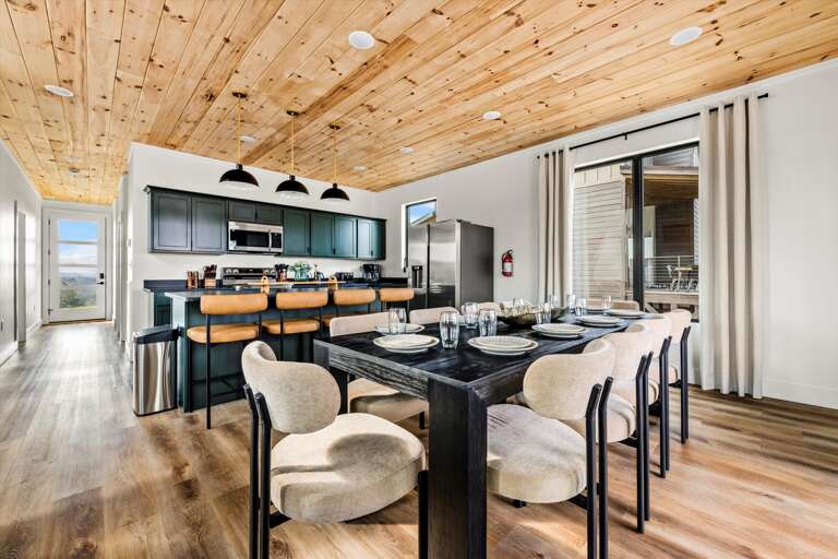 Main level: living room, with modern, open kitchen, dining and living room. Living Room features gas fireplace, large SMART TV, and Wifi