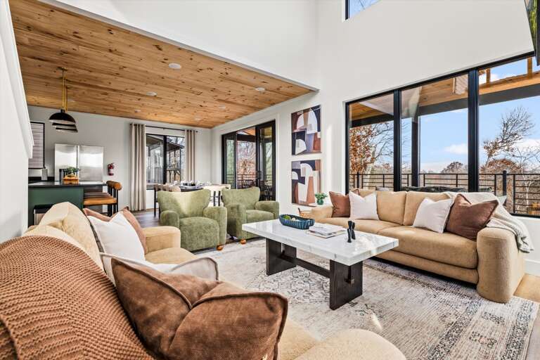 Main level: living room, with modern, open kitchen, dining and living room. Living Room features gas fireplace, large SMART TV, and Wifi