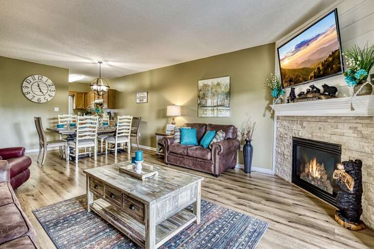 Spacious Living Room with Gas Fireplace, Sleeper Sofa and SMART TV with Cable & WIFI throughout vacation rental